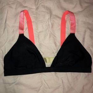 Black and neon swimsuit top